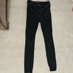Women’s black ripped jeans, Hollister, size 0.